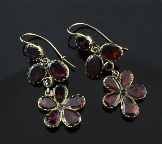 A pair of Georgian gold and foil backed almandine garnet drop earrings, overall 1.5in.